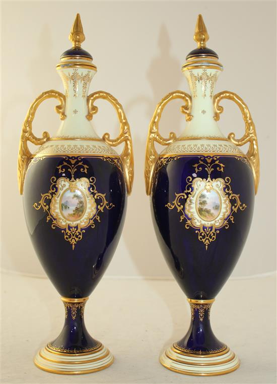 A pair of large Coalport oviform pedestal vases and covers, c.1902, 36cm